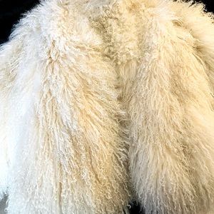 CURLY LAMB Coat. Like new  Beautiful. Worn twice. Satin lining luxurious cream.